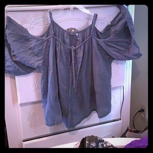 A navy blue flowing blouse